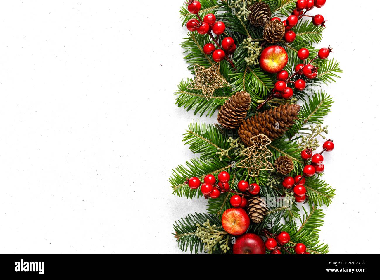 Christmas, Xmas, Noel or New Year background with winter festive Christmas holiday decoration on Christmas tree branches with copy space for a text of Stock Photo