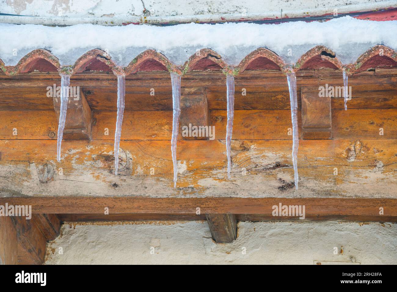Icicles in a rooftop. Stock Photo
