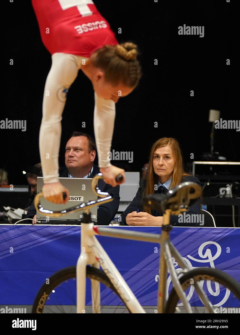 Judges watch Switzerland s Alessa Holtz during the Women Elite