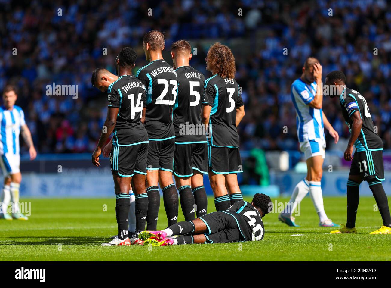 John Smith's Stadium, Huddersfield, England - 12th August 2023 Kelechi Iheanacho (14), Jannik Vestergaard (23), Callum Doyle (5), Wout Faes (3) and Wanya Maral-Madivadua (40) of Leicester City form a wall - during the game Huddersfield Town v Leicester City, Sky Bet Championship,  2023/24, John Smith's Stadium, Huddersfield, England - 12th August 2023 Credit: Mathew Marsden/WhiteRosePhotos/Alamy Live News Stock Photo