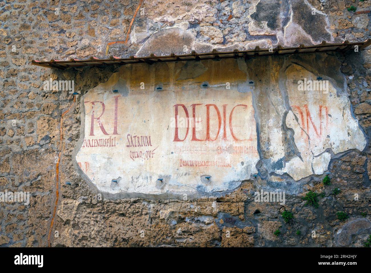 Pompeii Archaeological Site, Campania, Italy.  Fragment of graffiti thought to refer to gladiatorial games outside House of Trebio Valente in Via dell Stock Photo