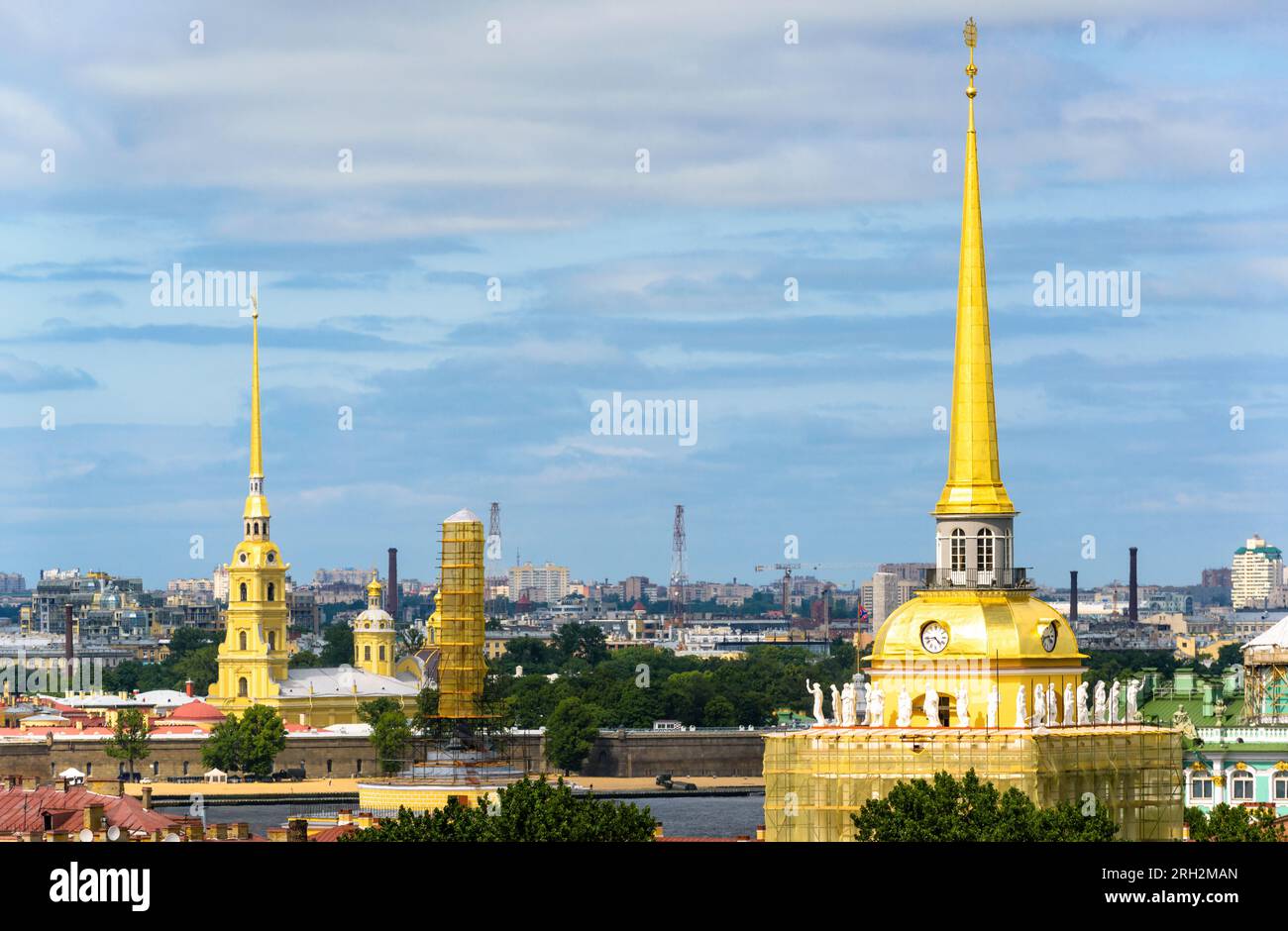 Skyline of Saint Petersburg, Russia. Golden spires of Admiralty and Peter and Paul Cathedral in summer morning. Historical buildings of St Petersburg Stock Photo