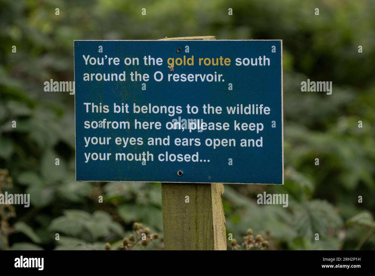 Warning notice to the public on a nature reserve to respect a wildlife area and remain silent at Tophill Low Reserve, East Yorkshire, U.K. Stock Photo