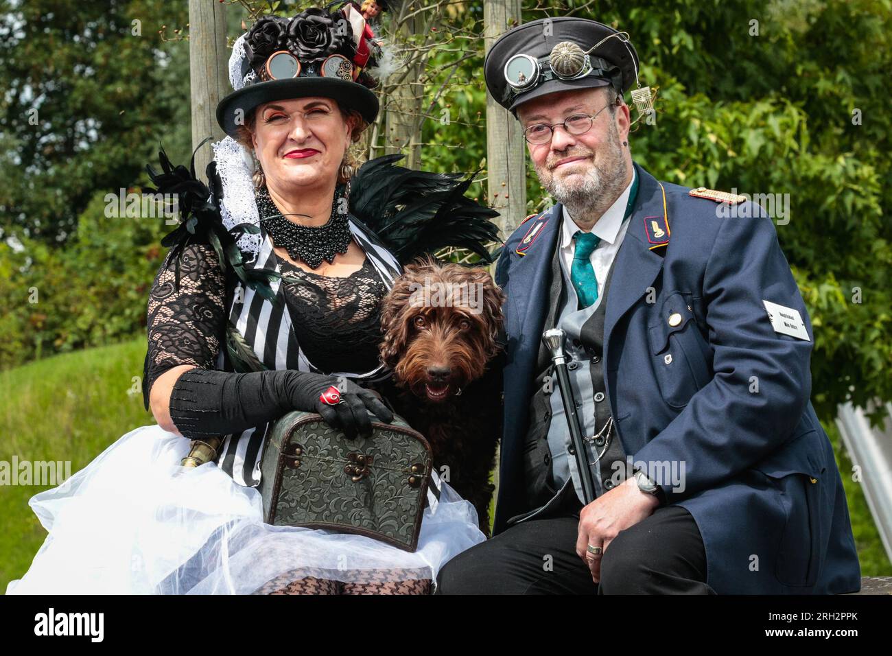 Henrichenburg, Waltrop, Germany. 13th Aug, 2023. Steampunk fans, groups and visitors, many in retro-futuristic or Victorian inspired outfits, have fun on the second day of the Steampunk Jubilee Festival weekend at the historic Henrichenburg boat lift, a listed industrial heritage site landmark. Credit: Imageplotter/Alamy Live News Stock Photo