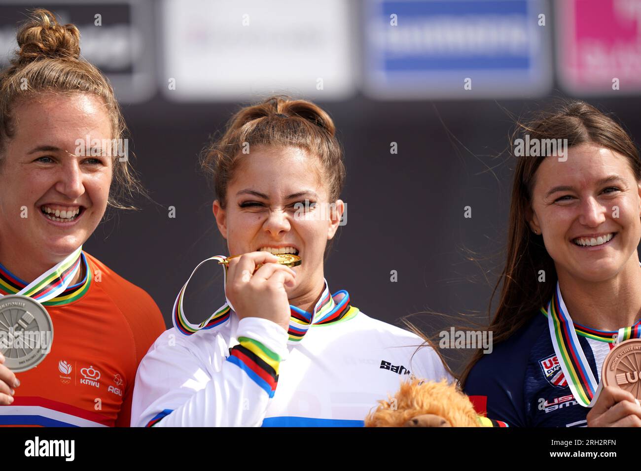 Great Britain's Bethany Shriever (centre) with her gold medal after winning the Women's Elite Final poses alongside Second placed Netherland's Laura Smulders (left) with her silver medal and third placed USA's Alise Willoughby with her bronze medal during day eleven of the 2023 UCI Cycling World Championships at the Glasgow BMX Centre, Glasgow. Picture date: Sunday August 13, 2023. Stock Photo