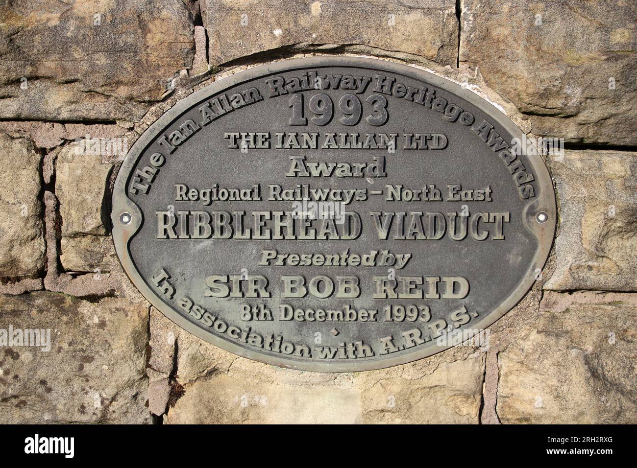 Oval plaque dated 1993 for Ian Allan Railway Heritage Award to Regional Railways (North East) for work on Ribblehead Viaduct. Stock Photo