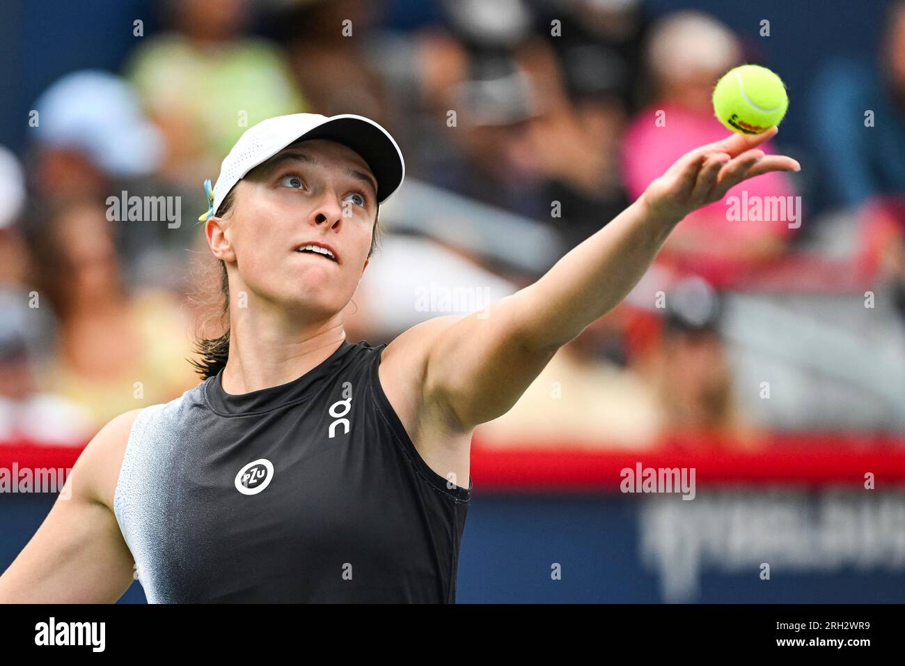 MONTREAL, QC - AUGUST 12: Iga Swiatek (POL) serves the ball during semi ...