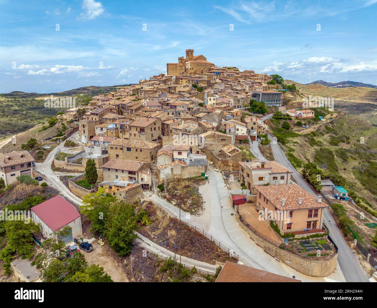 Aerial view of the hilltop medieval village of Ujue in Navarra, northern Spain on ancient pilgrim route Camino de Santiago or Way of St James. Nominat Stock Photo