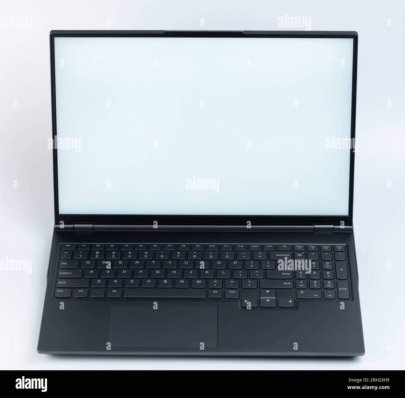Black laptop with full keyboard front view isolated on studio background Stock Photo