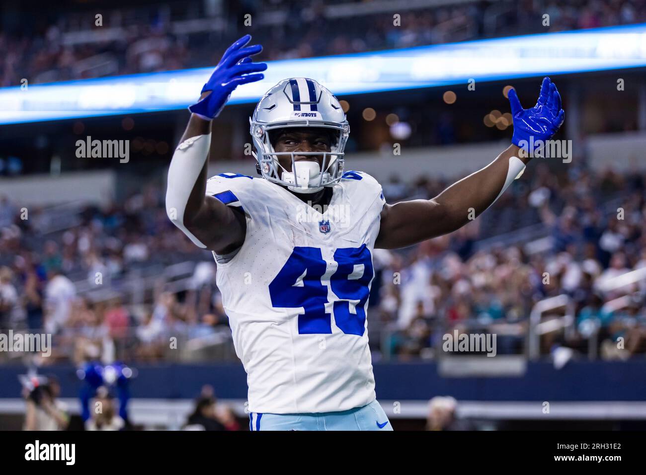 Dallas Cowboys wide receiver John Stephens Jr. (49) celebrates scoring a  touchdown during an NFL football