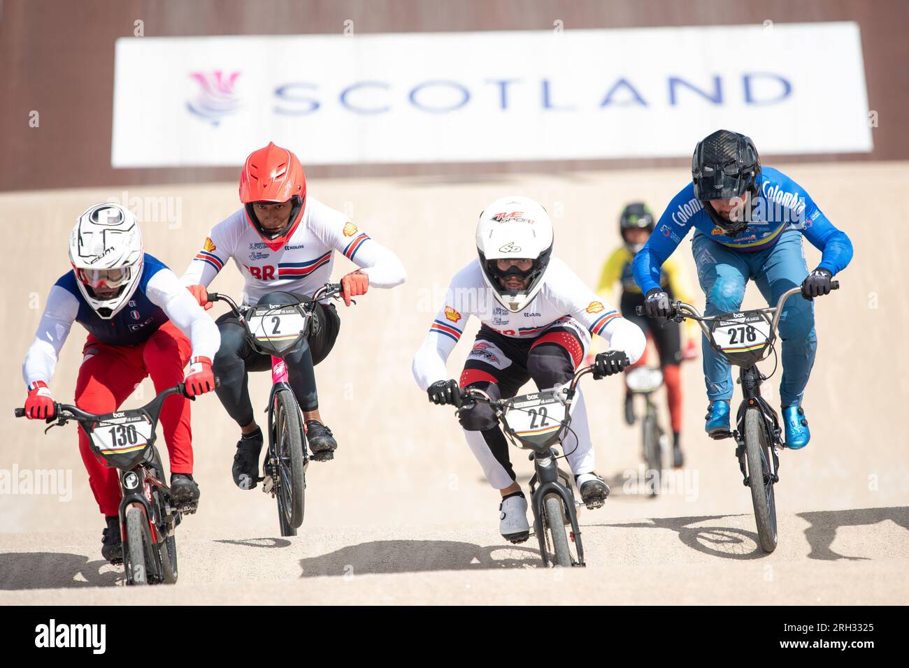 Glasgow BMX Centre, Glasgow, Scotland, UK. 13th Aug, 2023. UCI Cycling World Championships BMX Racing Men's Elite - a clean sweep for France with Romain Mahieu taking gold, Arthur Pilard silver and Joris Daudet bronze. GB's Cullen Ross finished in 6th position. Pictured: GBs Kye Whyte (centre) was eliminated DNF at the semi final stage Pictured: Kye Whye (2) and Cullen Ross (22) racing in the semi final Credit: Kay Roxby/Alamy Live News Stock Photo