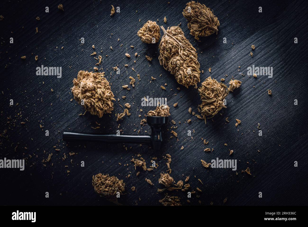 wooden smoking pipe and green hemp leaves on a white background, concept of  legalization of marijuana for alternative medicine Stock Photo - Alamy