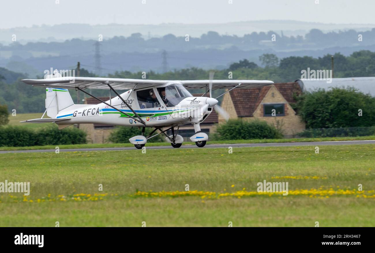IKarus C42 Microlight at Cotswold Airport using Zero SynAVGas UL91 fuel to power the aircraft engine to develop technology to reduce carbon emissions Stock Photo