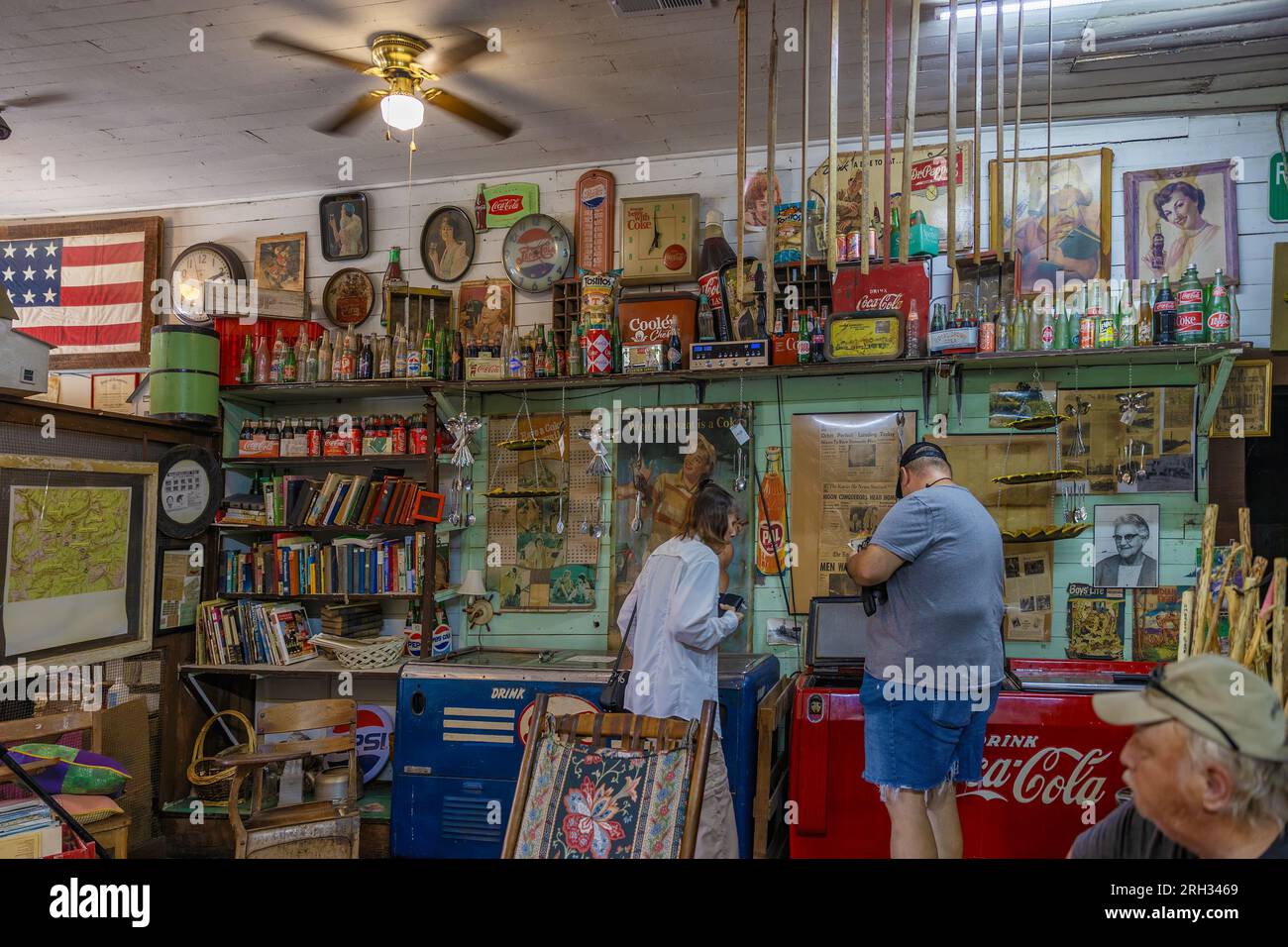 Rugby, Tennessee, USA - July 29, 2023: Tourist looking at all the Memorabilia that is everywhere in the R.M. Brooks General Store. Stock Photo