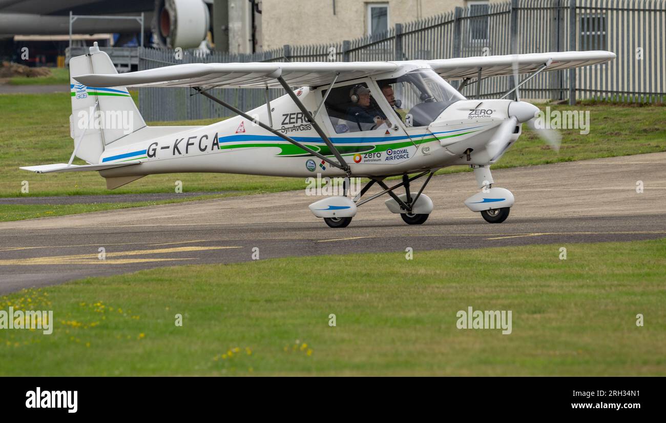 IKarus C42 Microlight at Cotswold Airport using Zero SynAVGas UL91 fuel to power the aircraft engine to develop technology to reduce carbon emissions Stock Photo