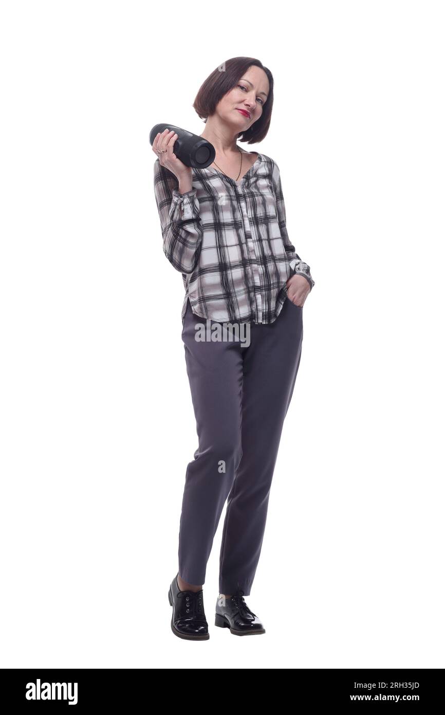 in full growth. happy mature woman with smart wireless column. isolated on a white background. Stock Photo
