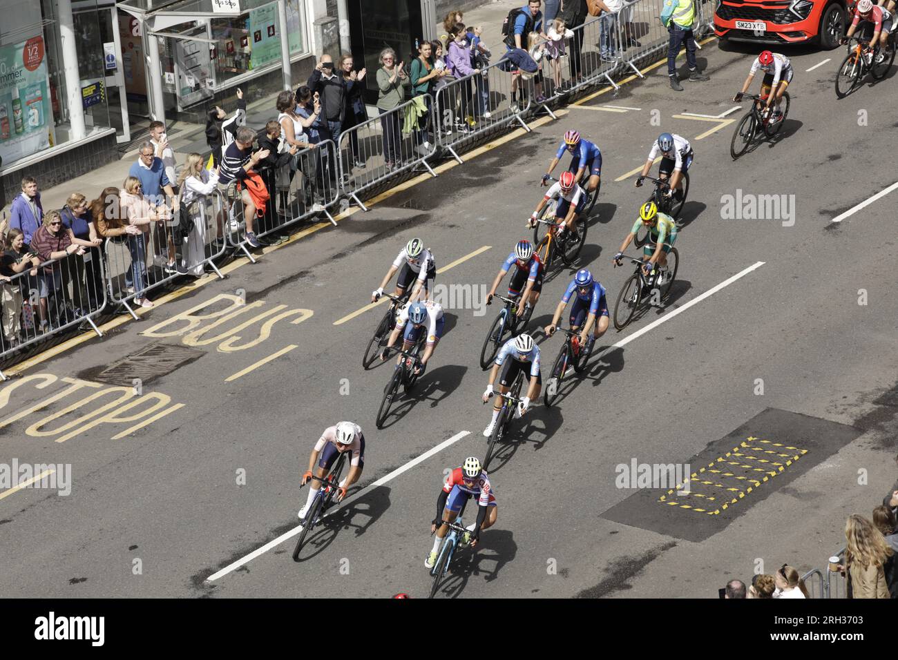 Glasgow, Scotland, UK. 13th August 2023. Canadilla Sierra of Cuba ahead of an international peloton turning from Byres Road into Great George Street during The UCI Cycling World Championships Women Elite Road Race, which started at Loch Lomond and ended with six laps of Glasgow's city streets. Credit: Elizabeth Leyden/Alamy Live News Stock Photo