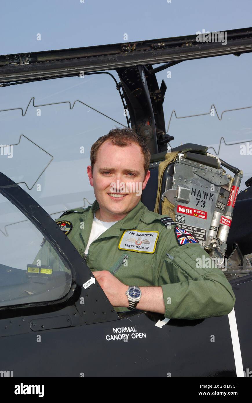 RAF pilot Matt Barker, Royal Air Force solo BAe Hawk air display pilot for 2009 sitting in the cockpit of a Hawk T1 with ejection seat. 208 Squadron Stock Photo