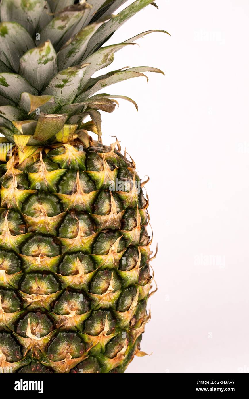 Close up pineapple fronds and peeling Stock Photo