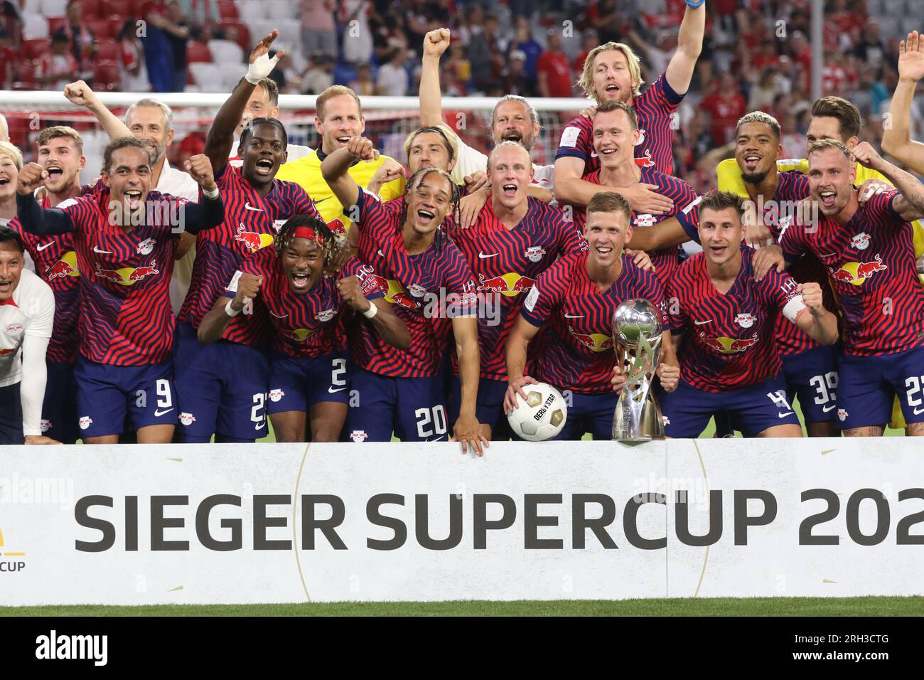 MUNICH, Germany 12. AUGUST 2023 4 Willi Orban (C) with trophy, RB
