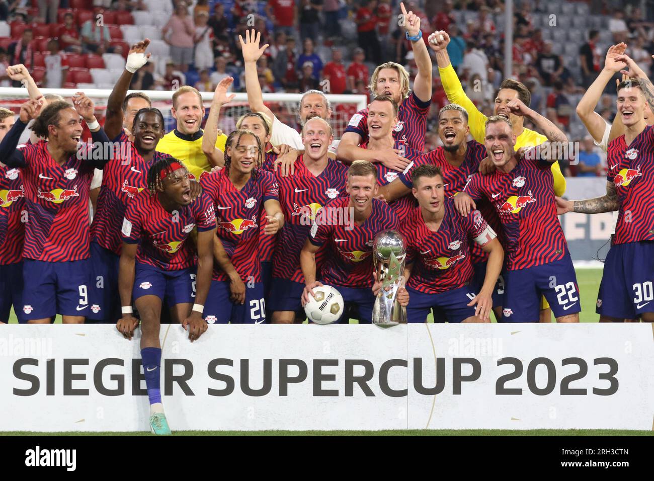 MUNICH, Germany 12. AUGUST 2023 4 Willi Orban (C) with trophy, RB