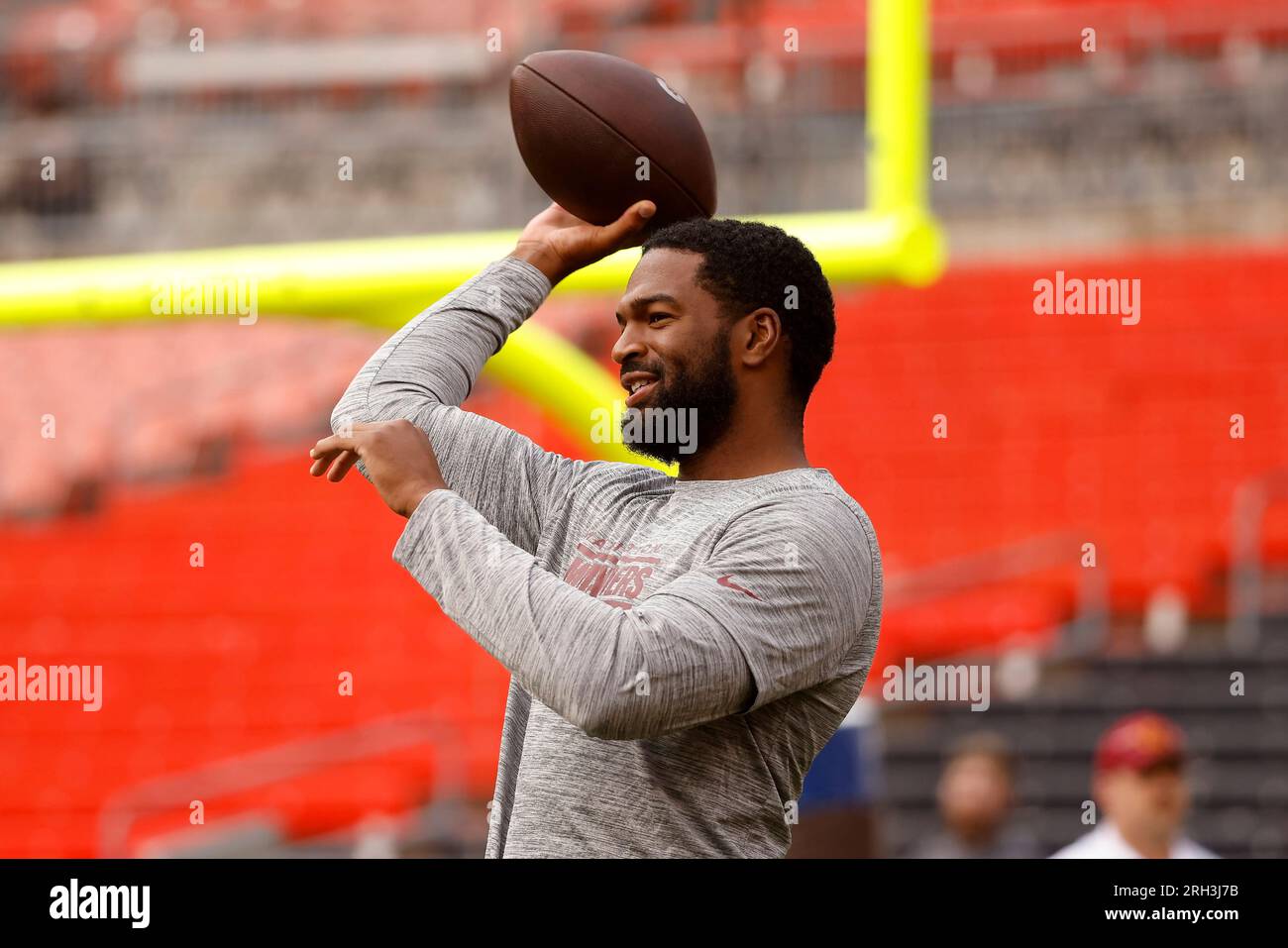 Washington Commanders quarterback Sam Howell (14) warms up prior to the  start of an NFL pre-season football game against the Cleveland Browns,  Friday, Aug. 11, 2023, in Cleveland. (AP Photo/Kirk Irwin Stock