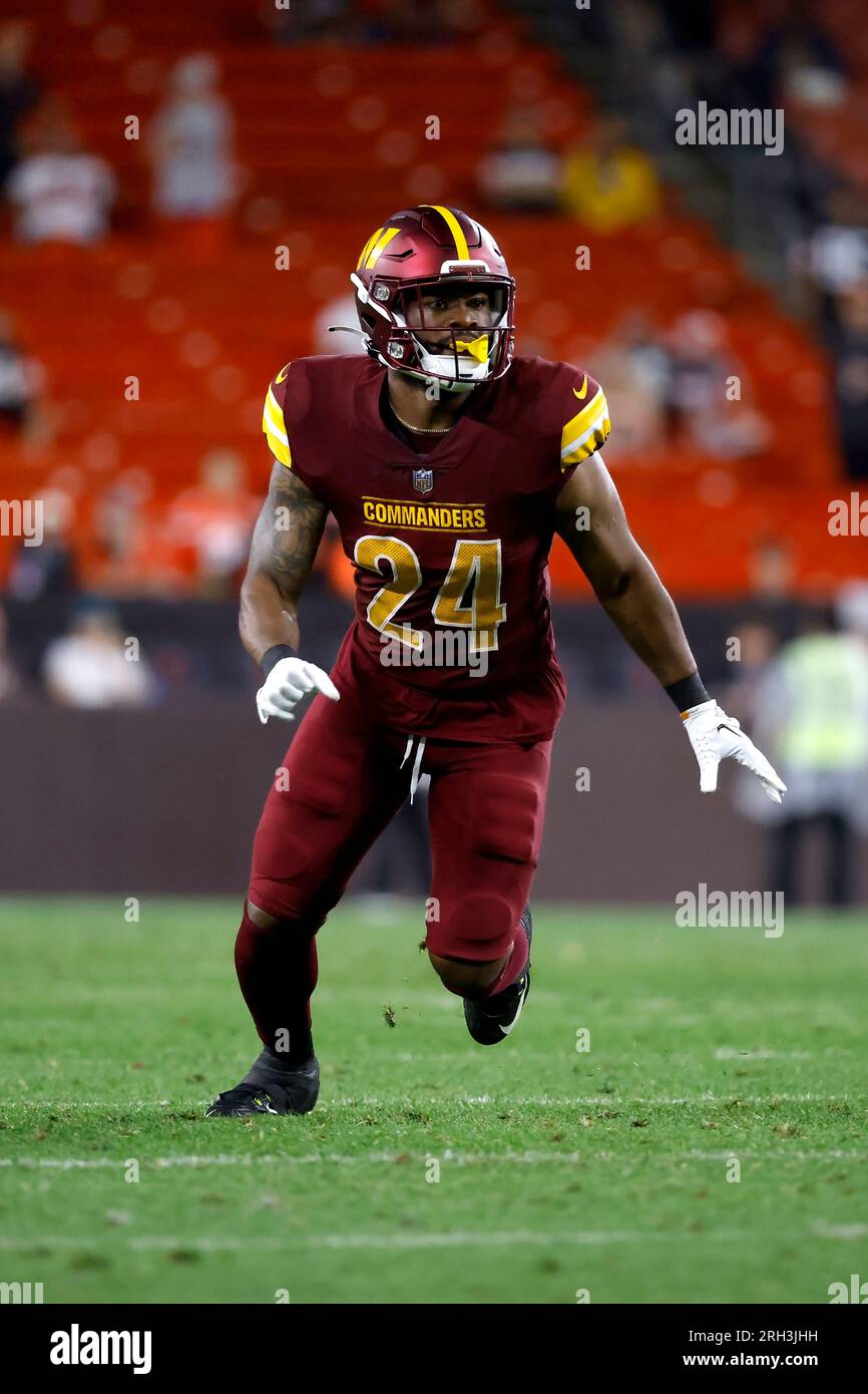 Washington Commanders safety Terrell Burgess (24) runs after the ball  during an NFL pre-season football game against the Cleveland Browns,  Friday, Aug. 11, 2023, in Cleveland. (AP Photo/Kirk Irwin Stock Photo -  Alamy