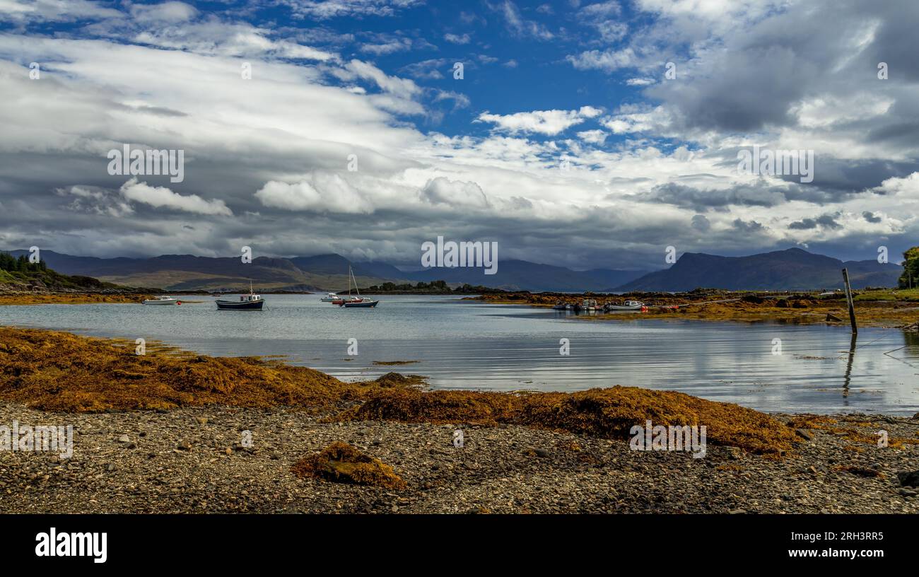 Landscape sea view with stormy and cloudy sky and reflection in the