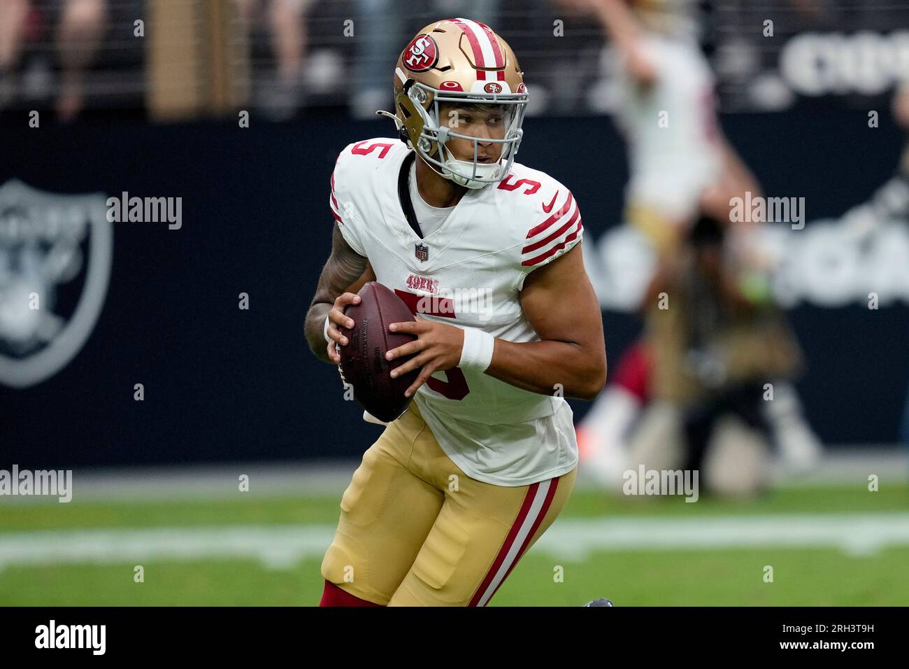 San Francisco 49ers quarterback Trey Lance (5) drops backs to pass against  the Las Vegas Raiders during the first half of an NFL preseason football  game, Sunday, Aug. 13, 2023, in Las