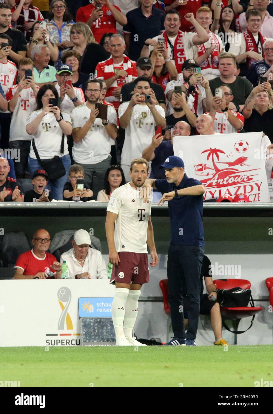 MUNICH, Germany. , . Harry KANE of England, now Fc Bayern Muenchen's number 9 is a newly signed player, forward in his first match for his new club, here seen during the Supercup Football match between Fc Bayern Muenchen and RB LEIPZIG at the Allianz Arena in Munich on 12. AUGUST 2023, Germany. Kane and Coach Thomas TUCHEL just before entering the pitch during the second half of the match. DFL, Fussball, 0:3 (Photo and copyright @ ATP images/Arthur THILL (THILL Arthur/ATP/SPP) Credit: SPP Sport Press Photo. /Alamy Live News Stock Photo