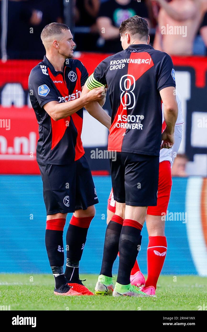 ALMERE, NETHERLANDS - AUGUST 13: Damian van Bruggen (Almere City) hands over the captaincy belt to Danny Post (Almere City) during the Eredivisie matc Stock Photo