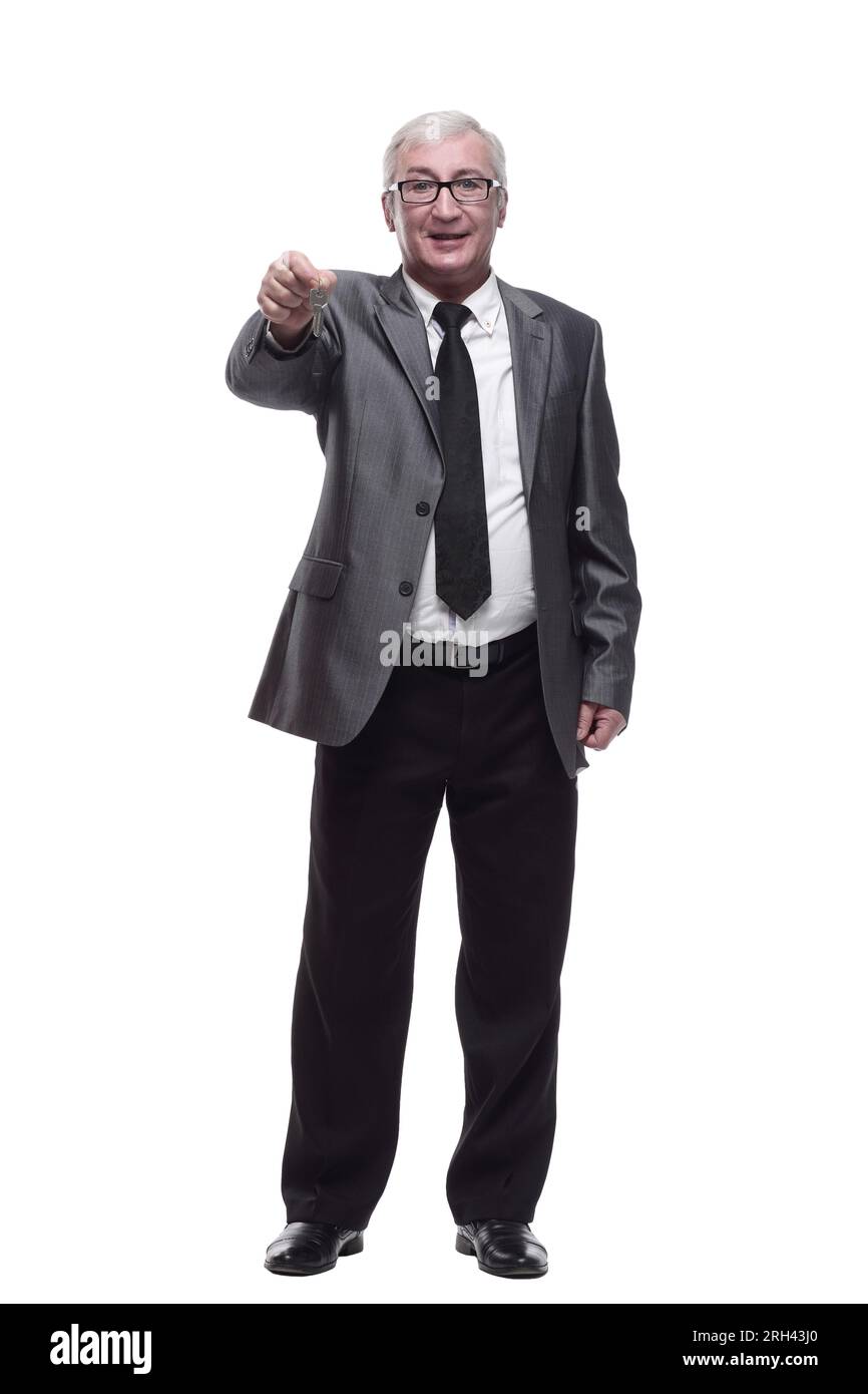 in full growth. business man with keys in hand Stock Photo - Alamy