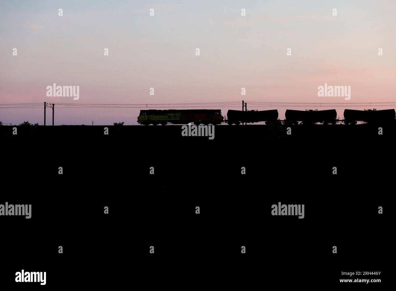 Colas Railfreight class 70 making a sunset silhouette at