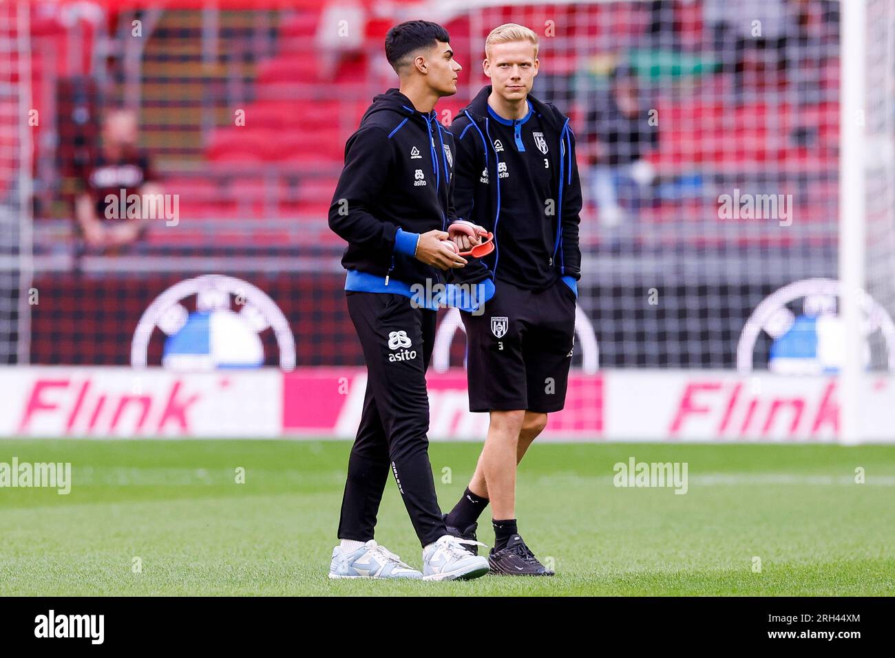 AMSTERDAM, NETHERLANDS - AUGUST 12: Antonio Satriano (Heracles Almelo) and Jannes Wieckhoff (Heracles Almelo) during the Eredivisie match of AFC Ajax Stock Photo