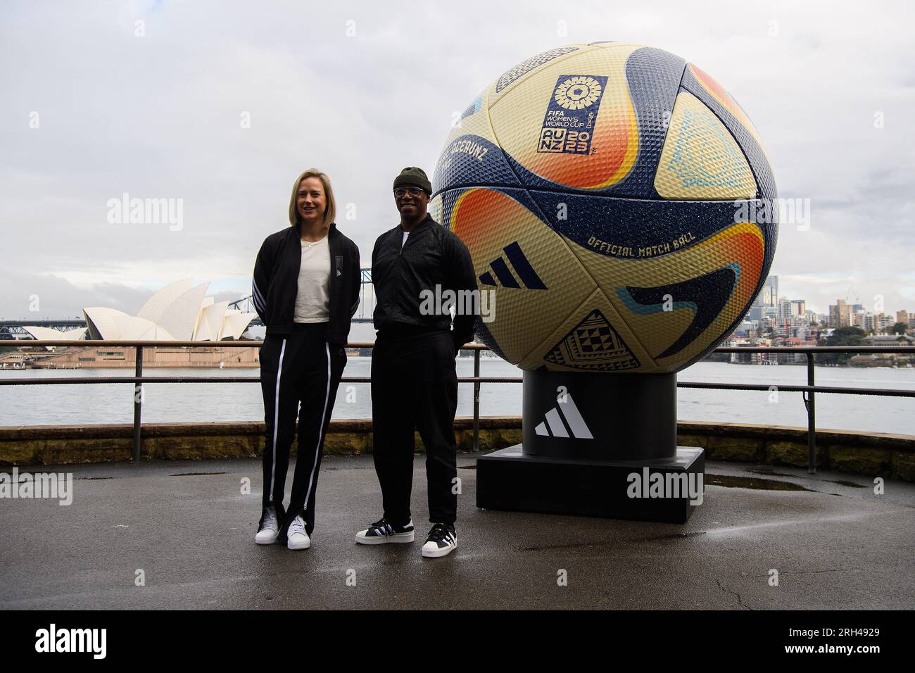 Sydney, Australia. 14th Aug, 2023. Former Matildas' player Ellyse Perry  (left), former English Premier League player Ian Wright pose for a  photograph during the unveiling of the official final match ball for