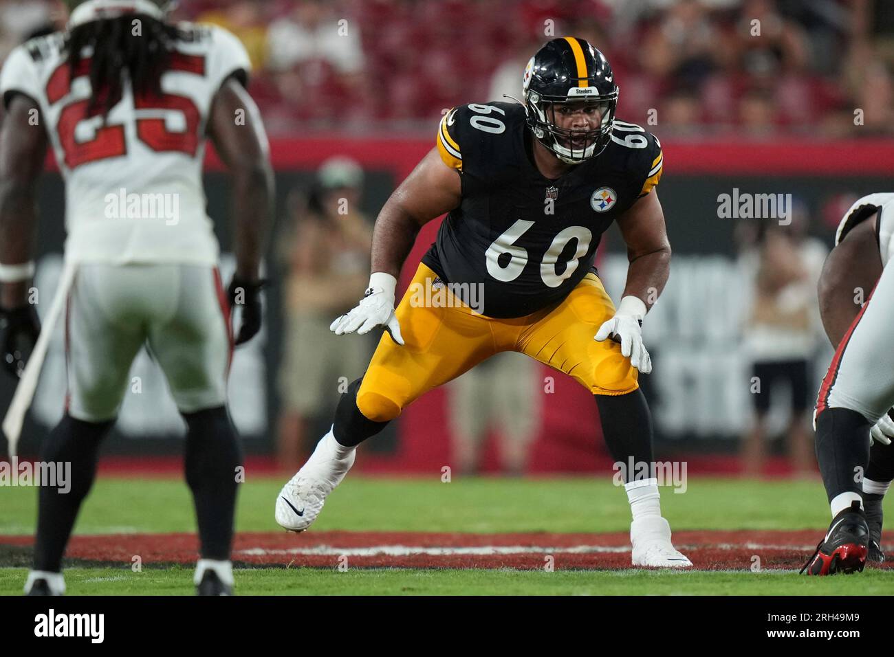 Pittsburgh Steelers offensive tackle Dylan Cook (60) protects the pock  during an NFL preseason football game against the Tampa Bay Buccaneers,  Friday, Aug. 11, 2023, in Tampa, Fla. (AP Photo/Peter Joneleit Stock