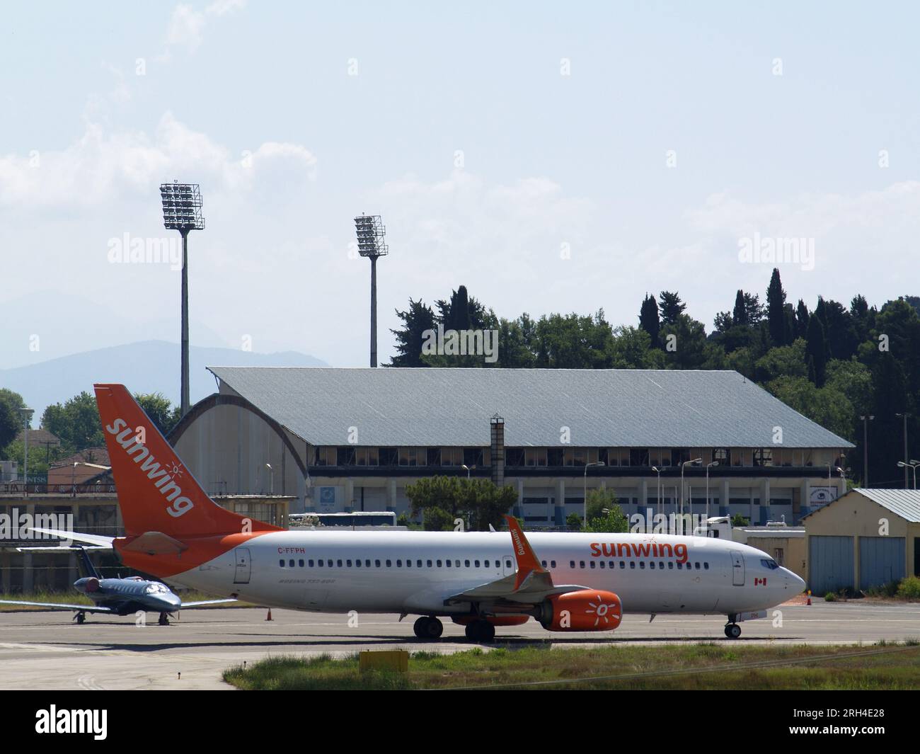 Sunwing Arlines Boeing 737-81D, C-FFPH taxiing at Ioannis Kapodistris Airport, Corfu, Greece Stock Photo