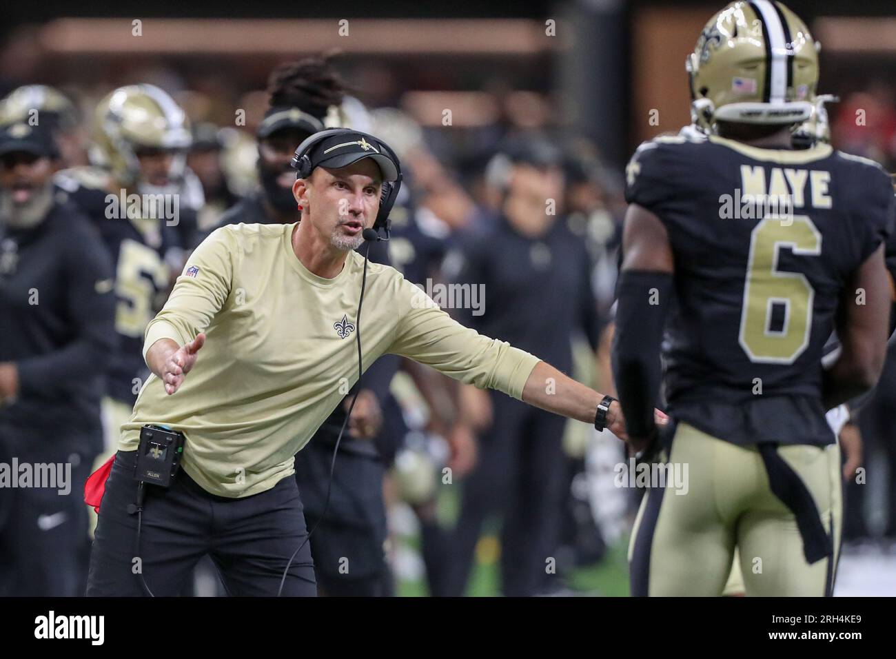 New Orleans, USA. August 13, 2023: New Orleans Saints Head Dennis Allen  encourages his players as they come off the field during NFL pre-season game  action between the New Orleans Saints and