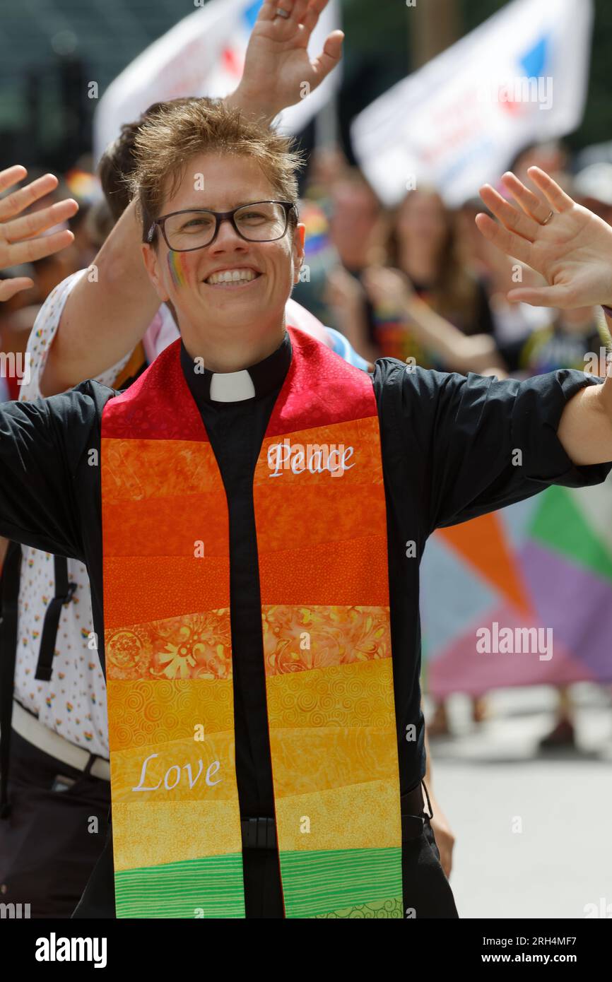 Members of the Trinity United Church of Rosemont participate in the  Montreal Pride Parade Stock Photo