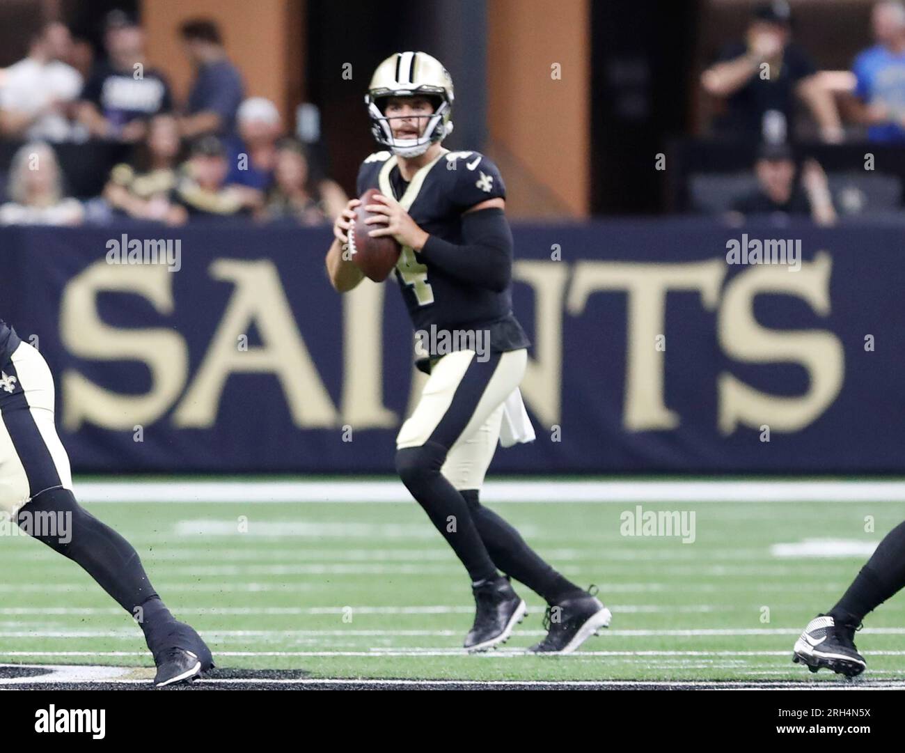 New Orleans, USA. 13th Aug, 2023. New Orleans Saints quarterback Derek Carr  (4) drops back to pass during a National Football League preseason game at  the Caesars Superdome in New Orleans, Louisiana