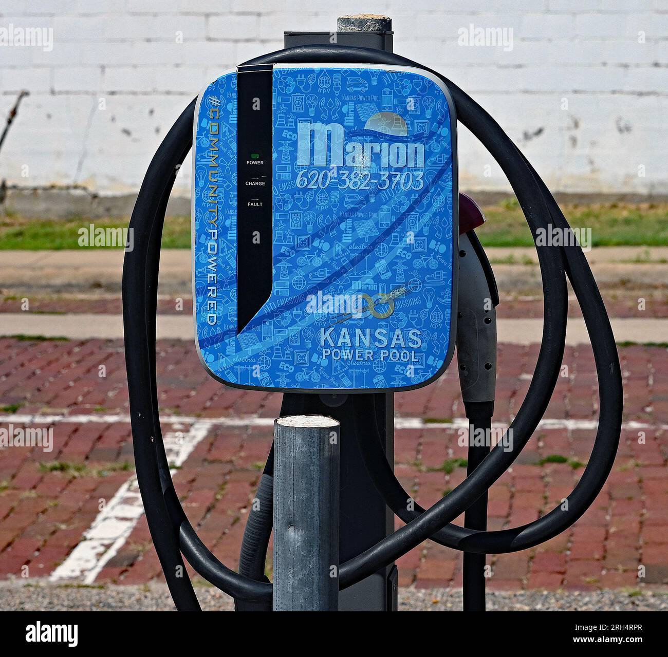 MARION, KANSAS AUGUST 12, 2023EV car chargers in public parking lot