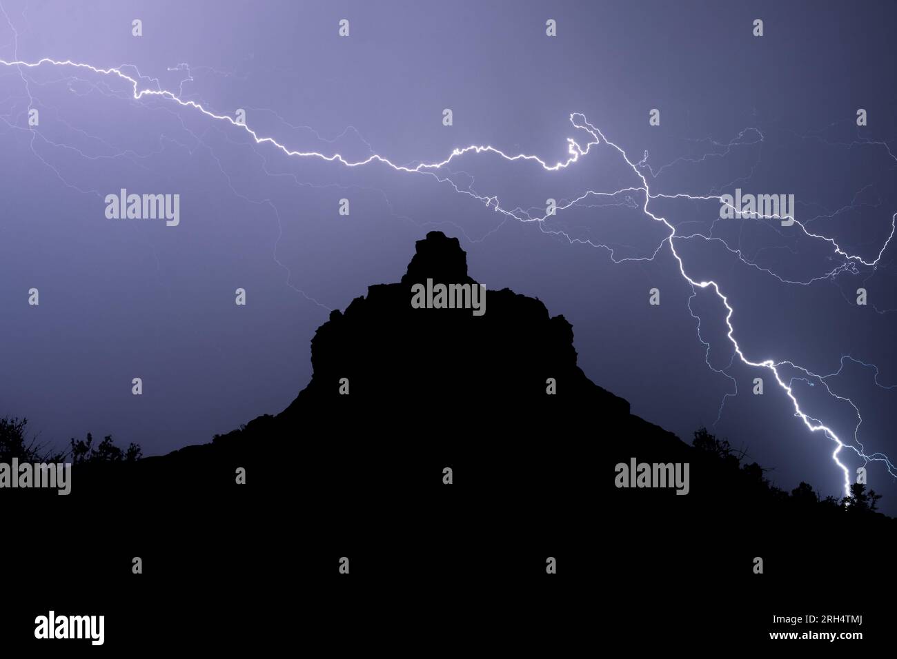 Lightning over Bell Rock in Sedona, Arizona Stock Photo