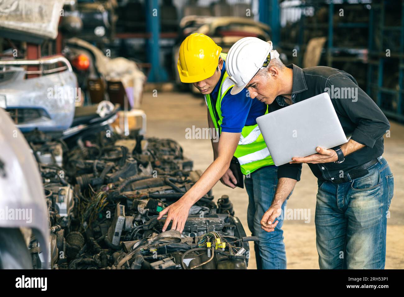 Senior engineer team check inventory store old used auto spare part