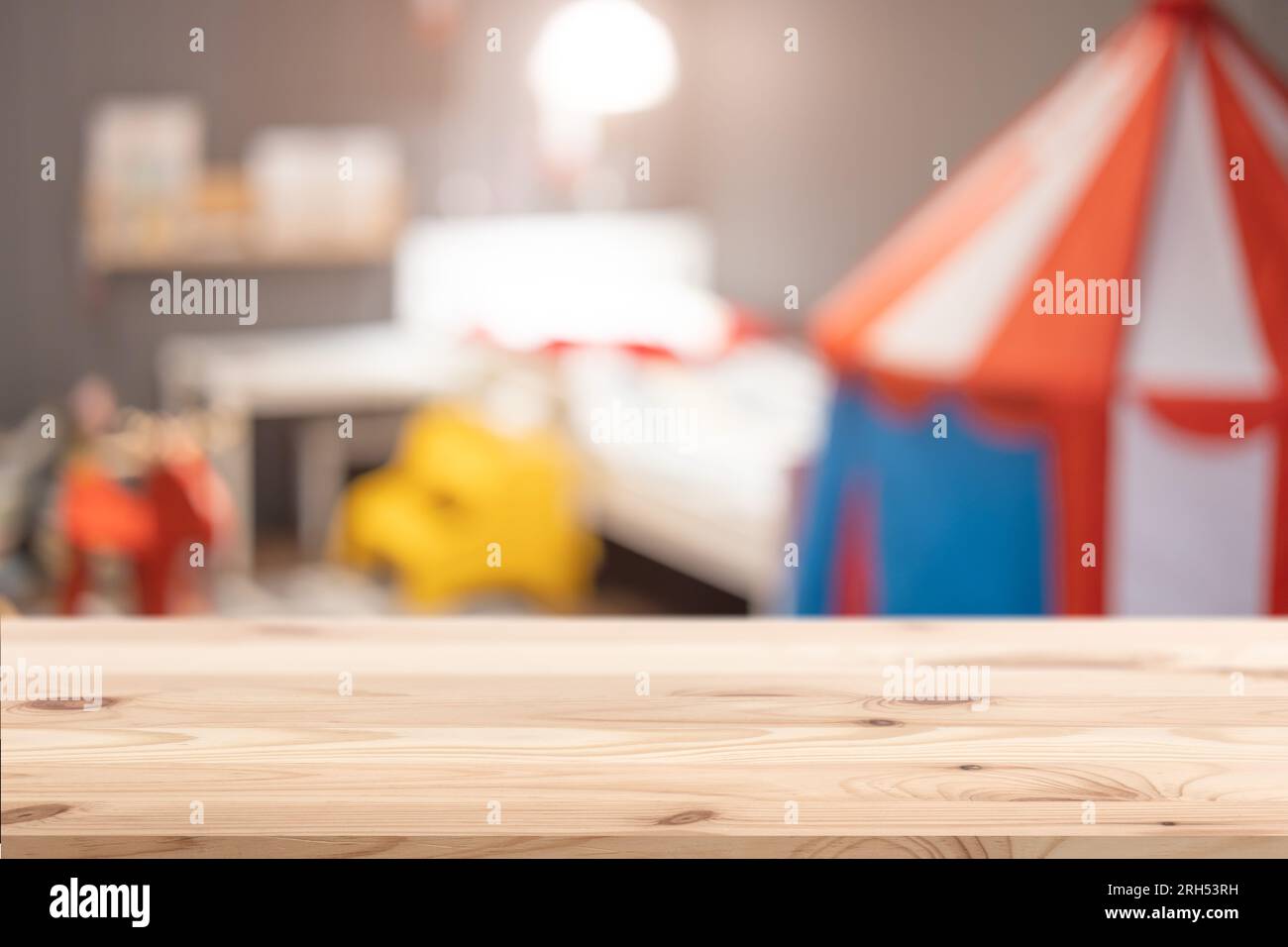 Wood foreground with blur kid children bedroom blur background for advertising display montage products Stock Photo