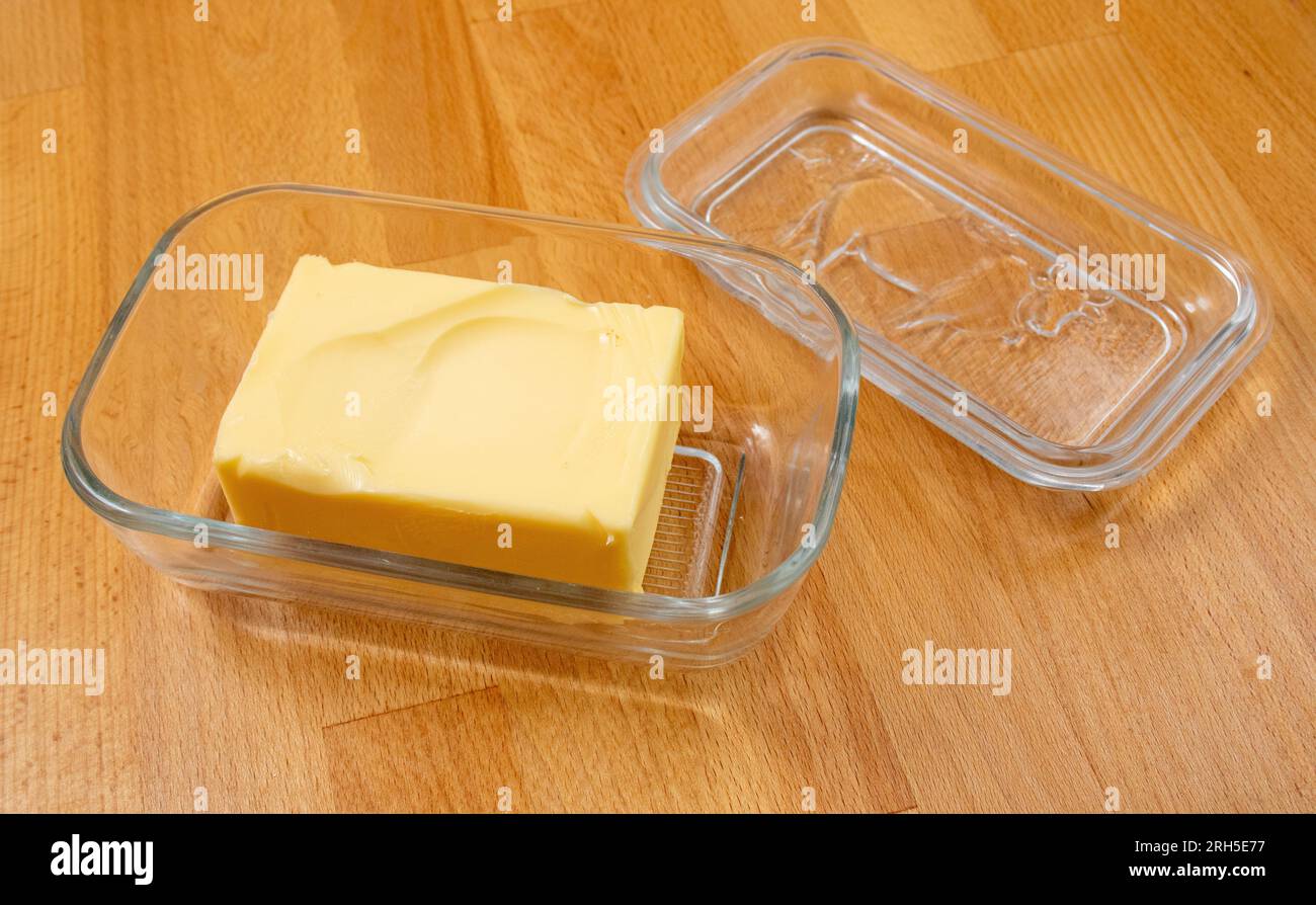 Charmingly unusual French glass butter dish with a cow in field design