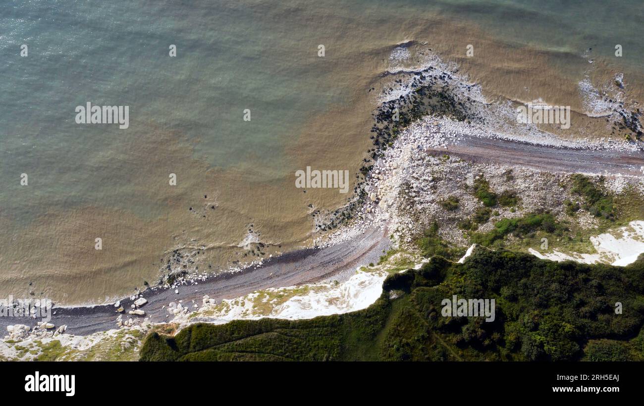 Aerial image from a drone, flying above the clifftop edge, looking down, at St Margret's Bay