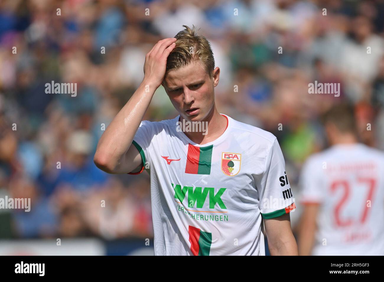 Frederik WINTHER (FC Augsburg), disappointment, frustrated, disappointed, frustrated, dejected, action, single image, cut single motif, half figure, half figure. Soccer DFB Cup 1st round, SpVgg Unterhaching - FC Augsburg 2-0 on August 13th, 2023, Alpenbauer Sportpark Unterhaching. DFL REGULATIONS PROHIBIT ANY USE OF PHOTOGRAPHS AS IMAGE SEQUENCES AND/OR QUASI-VIDEO. ? Stock Photo