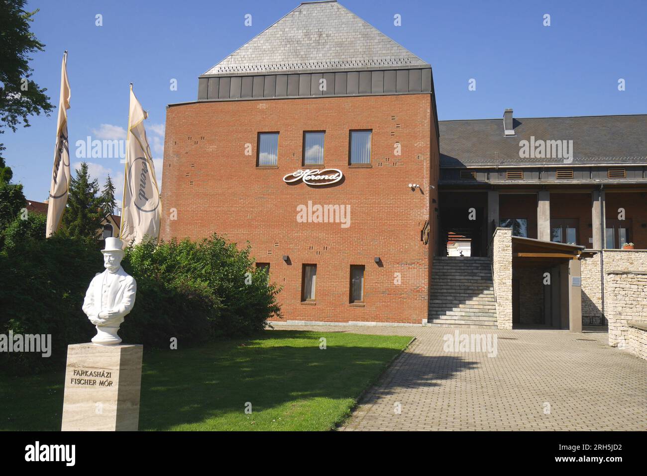 Herend porcelain factory with a statue of Moric Fischer de Farkashazy