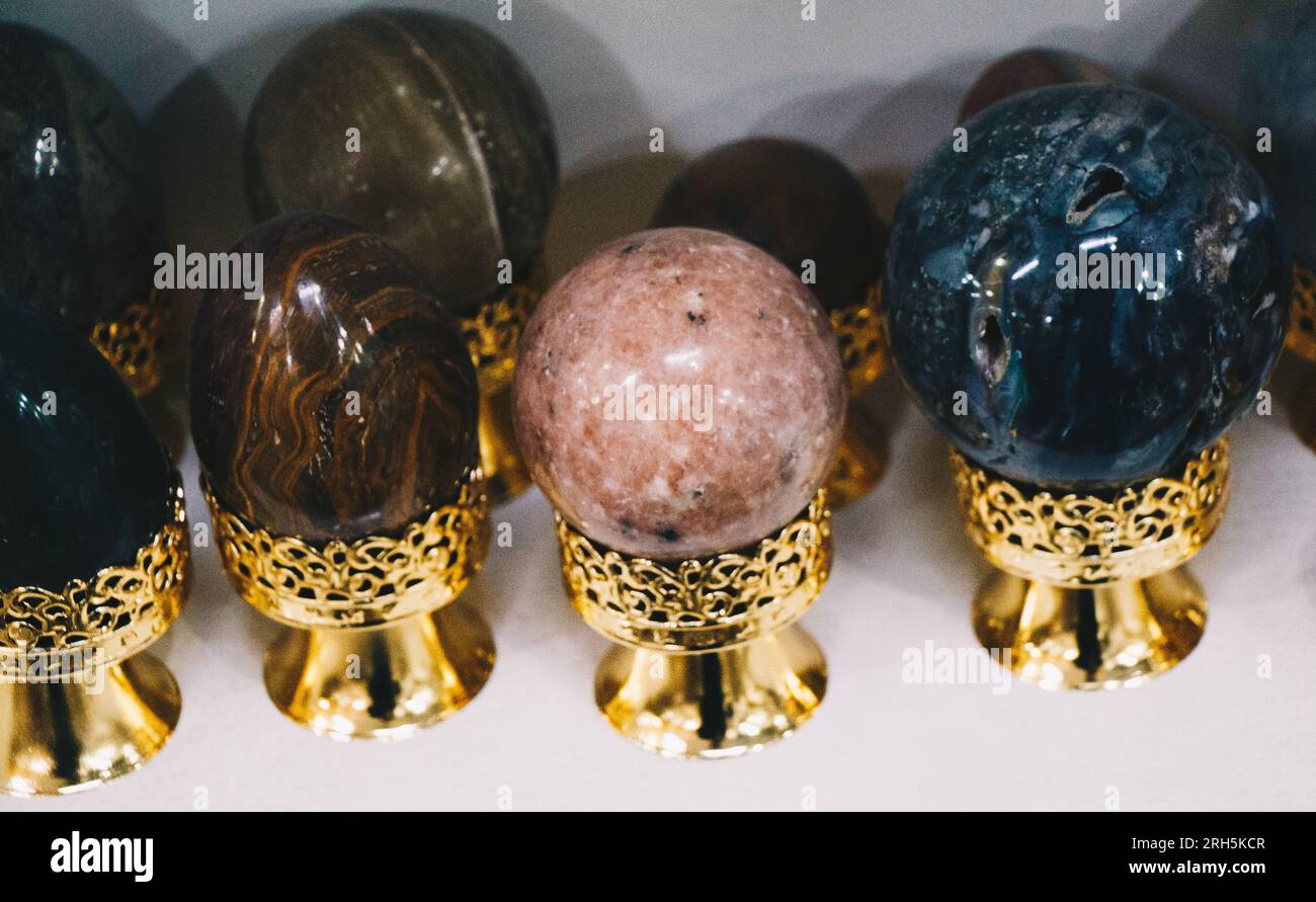Bright Colorful semi precious stones in round ball shapes Stock Photo