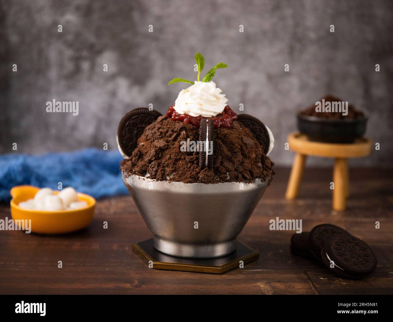 Korean shaved ice dessert with sweet toppings, chocolate cookies Bingsu